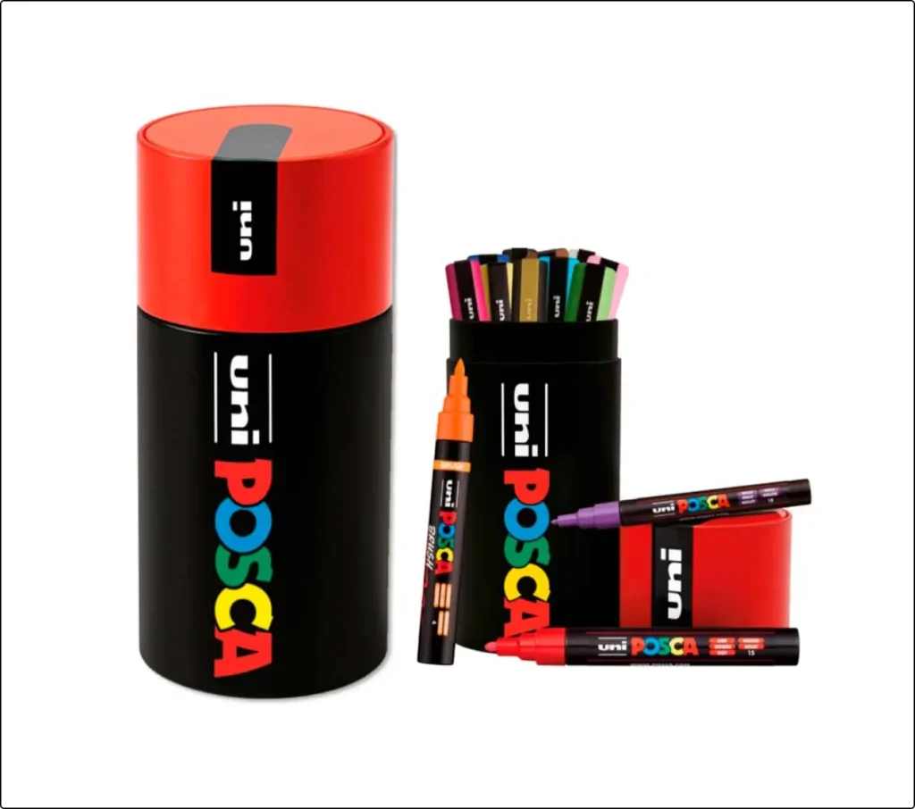 Estuche metálico rojo y negro Uni Posca con rotuladores de colores variados en su interior